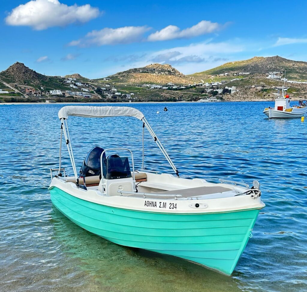 Rent a Boat Mykonos-ATHENA boat available for family trips.